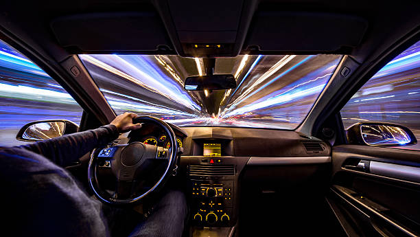 stadt nacht geschwindigkeit bewegung auto in städtischen barcelona langzeitbelichtung - car indoors inside of vehicle interior stock-fotos und bilder