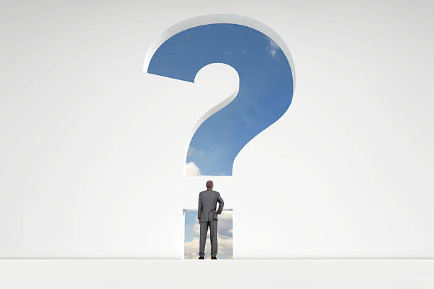 istock Businessman in front of a question mark doorway 611781586