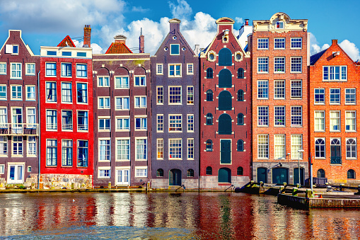 Detail of a series of tradtional terraced Dutch canal houses in central Amsterdam, Netherlands.