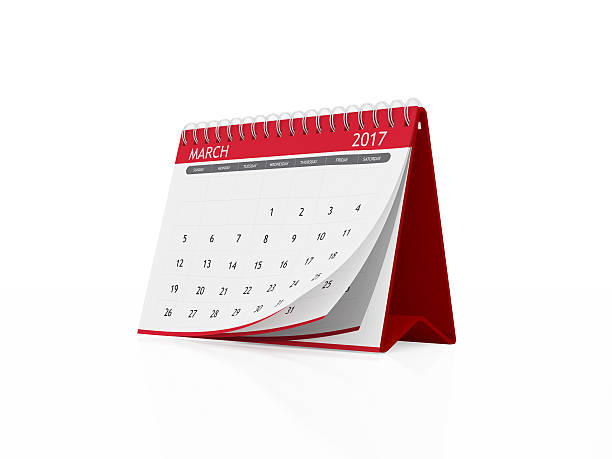 istock March 2017 Red Plastic Framed Desktop Calendar on White Backgrou 611782216