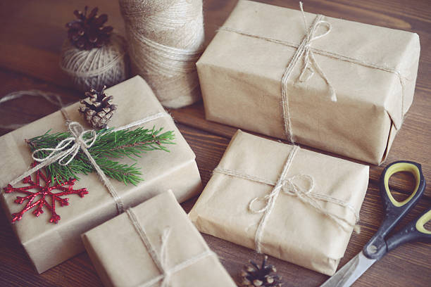istock Christmas homemade gift on a wooden background 611785706