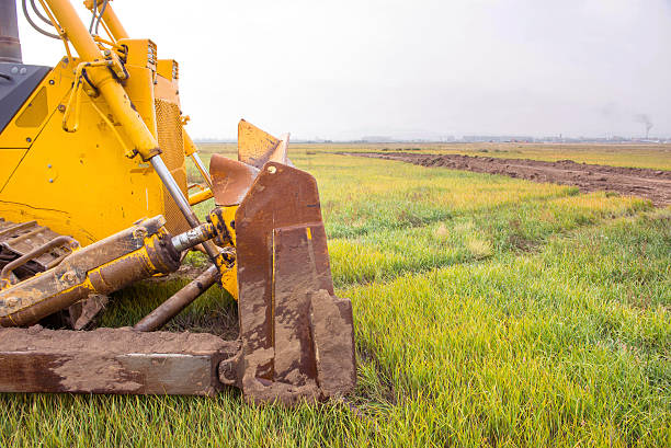 istock Bulldozer in the field 611786992