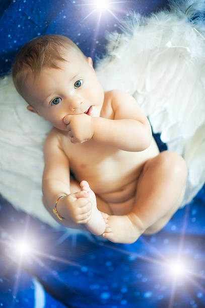 istock Baby with angel wings 611787354