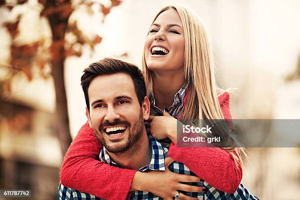 Couple Enjoying Outside Stock Photo - Download Image Now - Adult, Autumn, Back