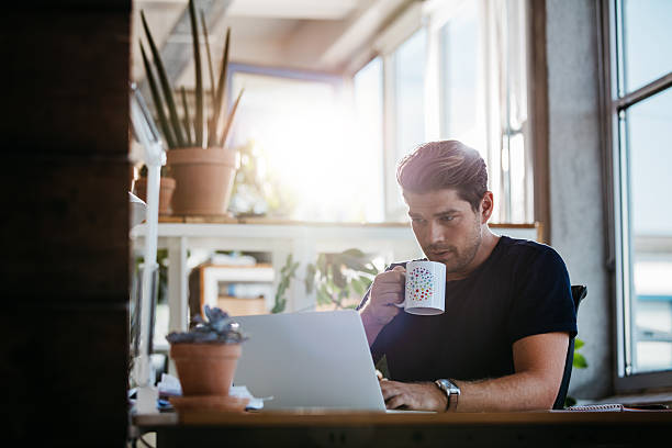 istock Business man working on laptop in office 611788784