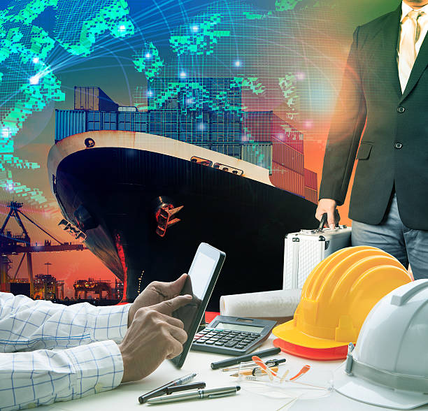 istock working man and investor against container ship in 611788828