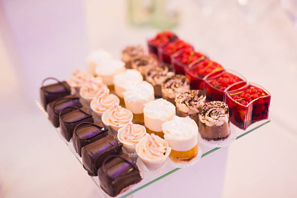 istock Different kinds of baked sweets on a buffet 611789862