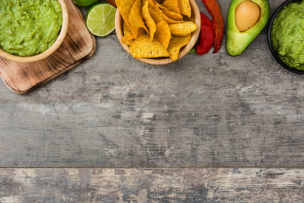 istock Nachos, guacamole and ingredients 611790138