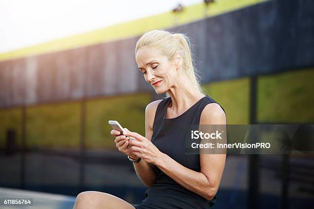 Tendered Woman Texting Friends Stock Photo - Download Image Now - Adult, Affectionate, Arts Culture and Entertainment