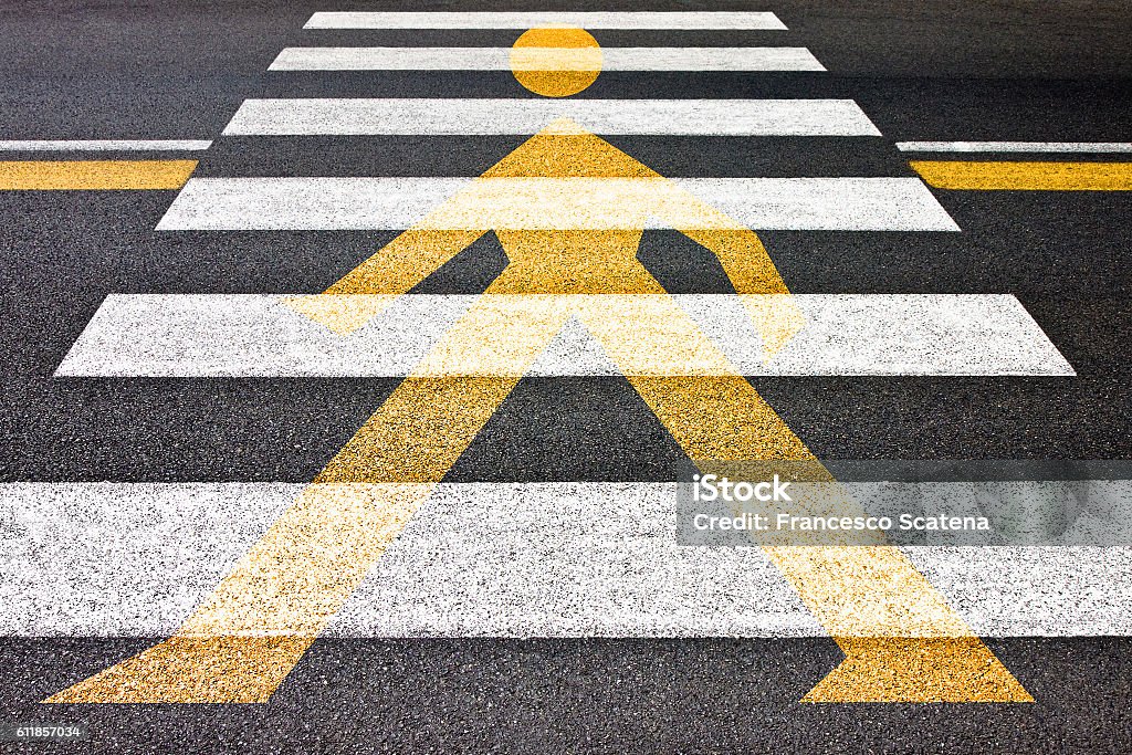Black and white pedestrian crossing with silhouette of man Black and white pedestrian crossing with silhouette of man on it Pedestrian Stock Photo