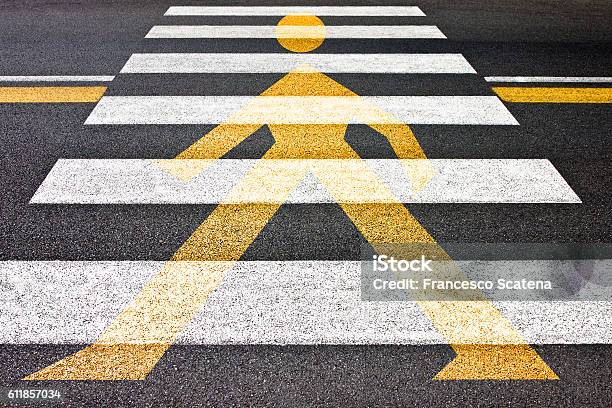 Black And White Pedestrian Crossing With Silhouette Of Man Stock Photo - Download Image Now