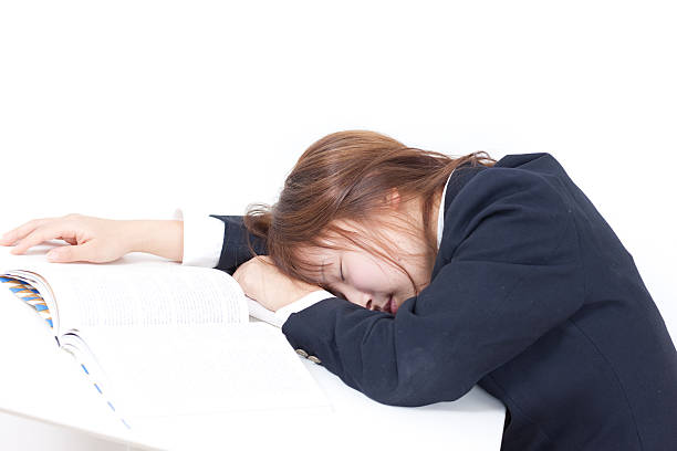 istock Japanese schoolgirl studying 611859176