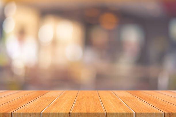 istock Wooden board empty table in front of blurred background 611860804