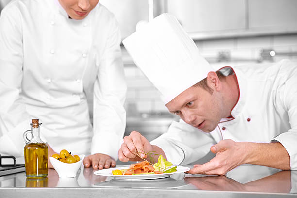 istock Chefs preparing the delicious salmon 611861596