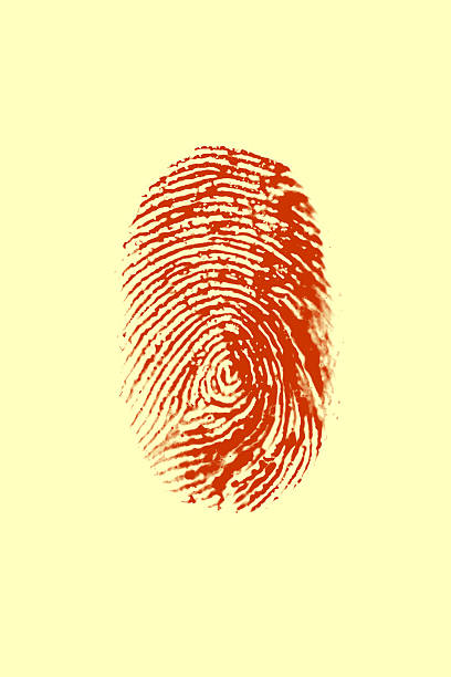 istock Red Fingerprint on yellow background 611864362
