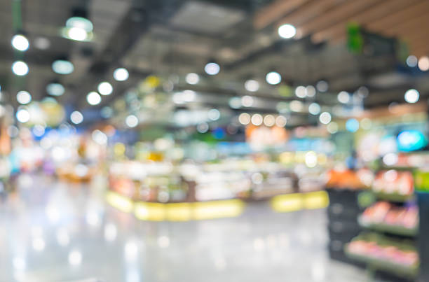 Blurred background, Customer shopping at supermarket store with stock photo