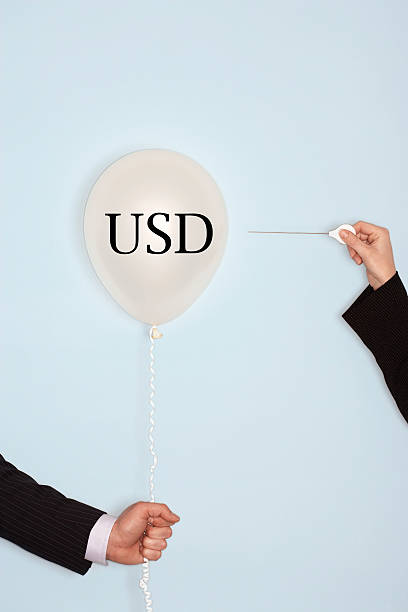 istock Popping balloon with text saying USD 611867292