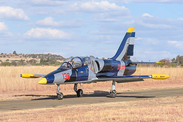 Aero L-39 Albatros aircraft Bloemfontein, South Africa - July 16, 2016: An unidentified pilot in an Aero L-39 Albatros in a public display at the Tempe Airport at Bloemfontein aero l 39 albatros stock pictures, royalty-free photos & images