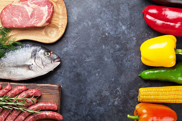 istock Vegetables, fish and meat cooking 611868602