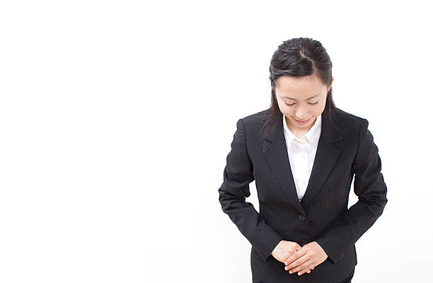 istock Businesswoman bowing 611869142