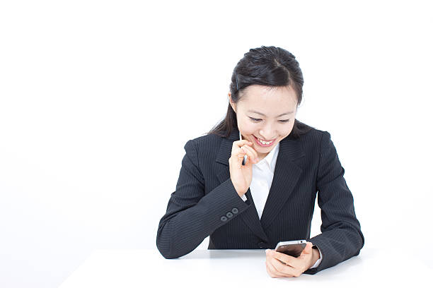 istock Businesswoman using a smartphone 611870456