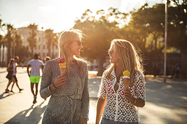 istock Walking and eating ice cream 611870928