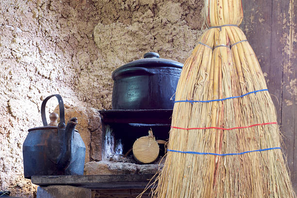 istock The kettle and the rustic wood-burning stove 611872172