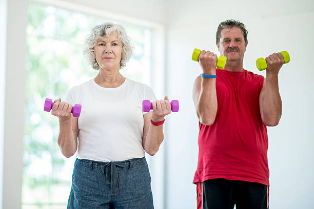 istock Bicep Curls at the Gym 611873446