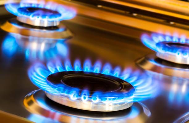 lifted Gas Burners with Blue Flames camping stove photos stock pictures, royalty-free photos & images