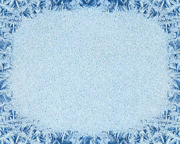 istock Winter background, frost on window 611876620