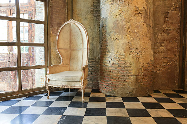 istock old concrete wall  and chair 611876826