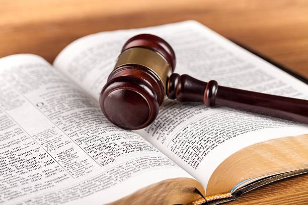 Law Gavel on Open Bible Bible stock pictures, royalty-free photos & images