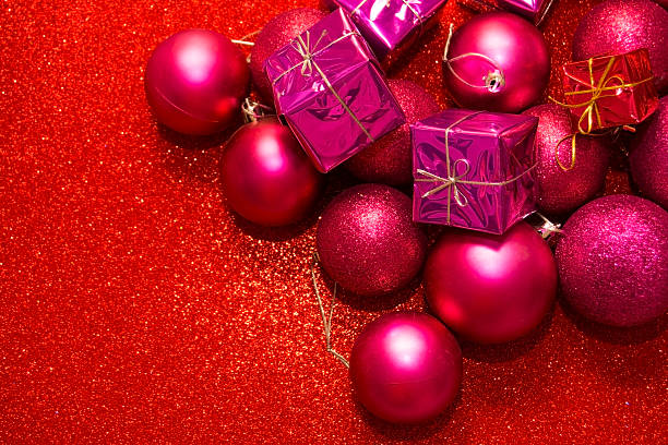 istock Gifts and Christmas decorations on red background 611878916