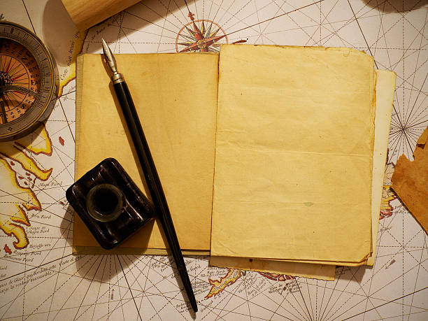 istock Ship's journal and navigational equipment 611880024