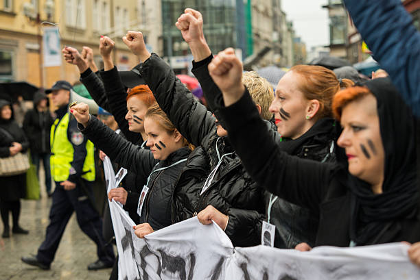protest against anti-abortion law  Wroclaw, Poland, October 3, 2016 - protest against anti-abortion law forced by Polish government PIS, black protest - "czarny protest" on 03,10,2016 in Wroclaw, Poland abortion photos stock pictures, royalty-free photos & images