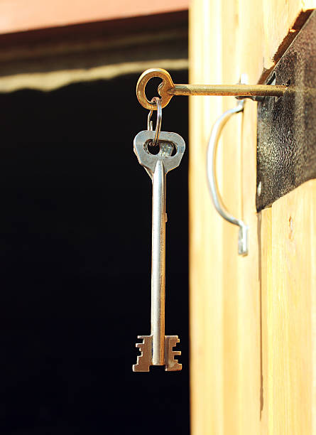 istock The old key in the lock 611880990