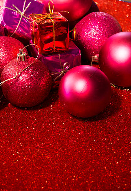istock Gifts and Christmas decorations on red background 611882056