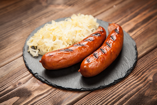 Traditional german food of sauerkraut and bratwurst