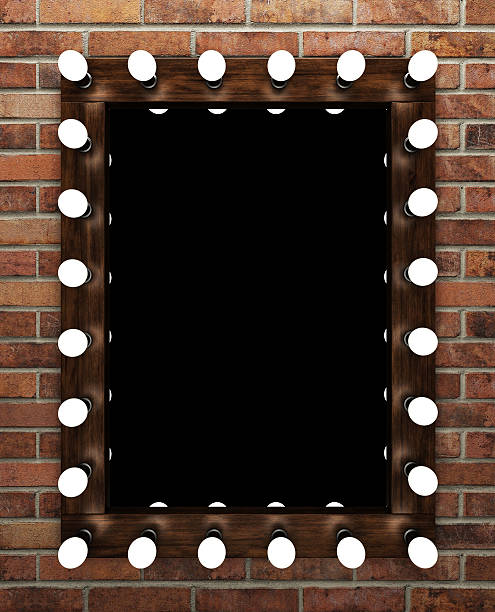 Wooden makeup mirror on brick wall Wooden makeup mirror on brick wall. 3D rendering theatre mirror stock pictures, royalty-free photos & images