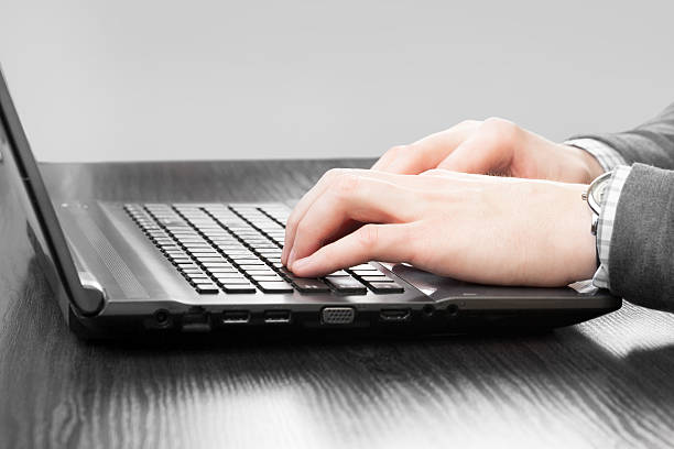 istock Business person working at his laptop 611887204