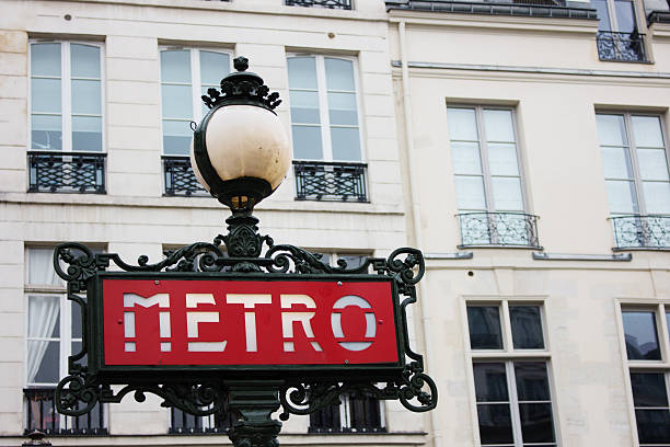 istock Paris Balconies and metro sign 611887300