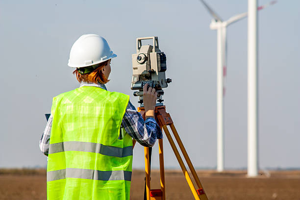 istock field measuring at windfarm 611889150