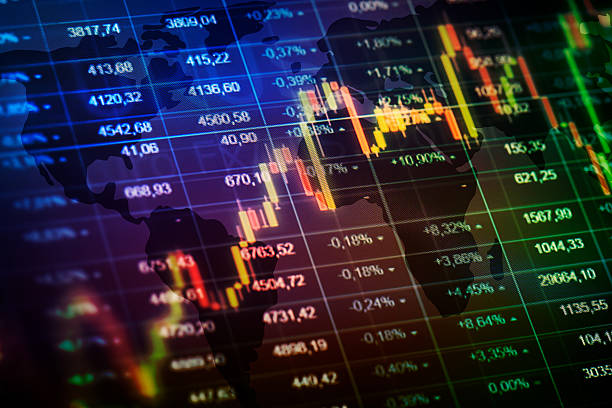 istock Computer monitor with trading software. Multiple exposure photog 611890440