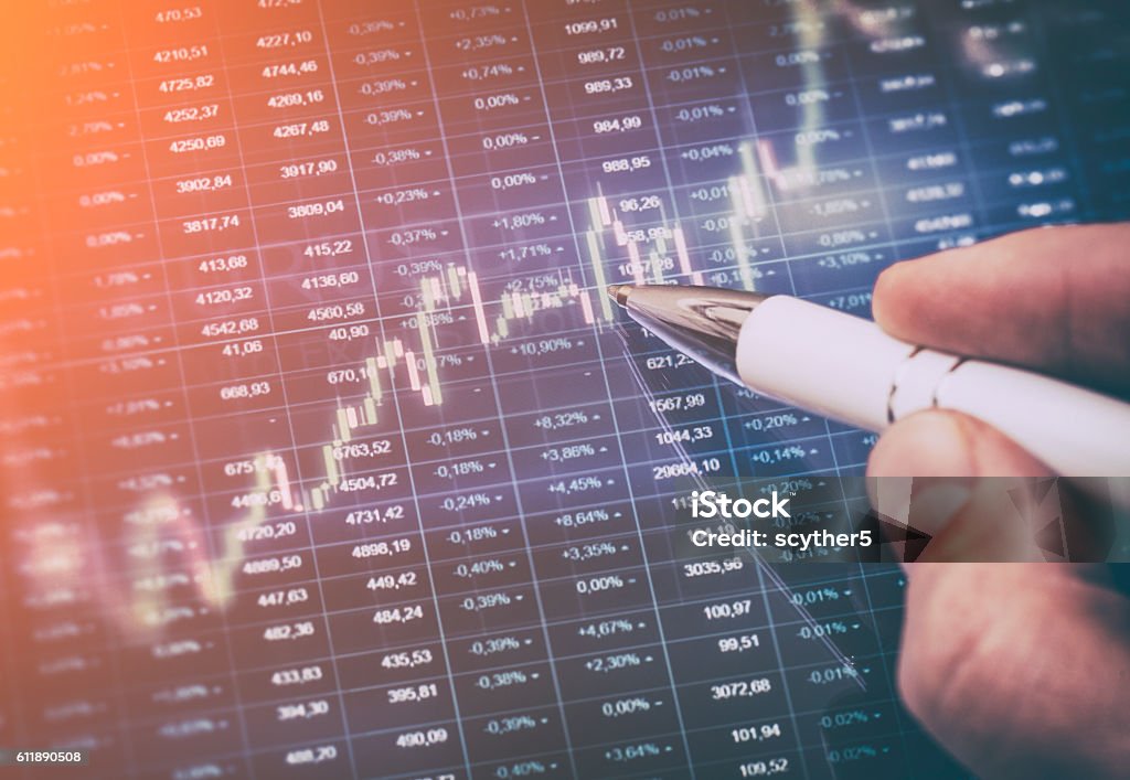 Computer monitor with trading software. Candle stick graph and bar chart of stock market investment trading. Analysis Forex price display on computer screen. Abstract Stock Photo