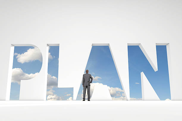 istock Businessman in front of plan word doorway 611894524