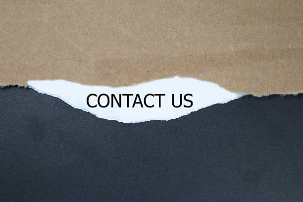 istock contact us word written under torn paper 611894596
