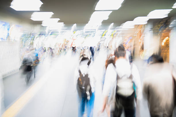 istock Group of Blurred People, Students Walking, Kyoto, Japan 611894882
