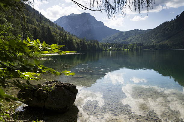 istock Mountain lake Vorderer Langbathsee in Salzkammergut, Upper Austria 611897318