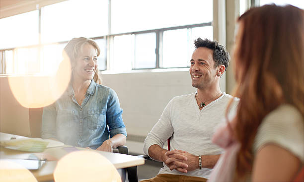 Unposed group of creative business people in an open concept