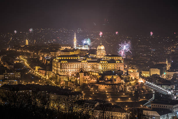 Royal Palace and Fireworks at Night in Budapest, Hungary New Year Celebration. Buda Castle or Royal Palace in Budapest, Hungary with Fireworks at Night gellert stock pictures, royalty-free photos & images